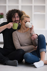 Image showing young couple in their new home