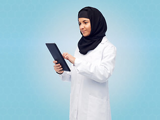 Image showing muslim female doctor in hijab with tablet pc