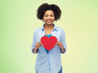 Image showing happy african american woman with red heart shape