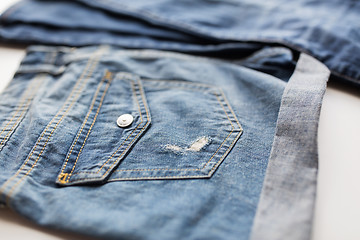 Image showing close up of denim pants or jeans with pocket