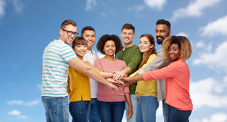 Image showing international group of happy people holding hands