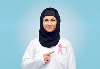 Image showing muslim doctor with breast cancer awareness ribbon