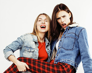 Image showing best friends teenage girls together having fun, posing emotional on white background, besties happy smiling, lifestyle people concept close up