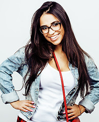 Image showing young happy smiling latin american teenage girl emotional posing on white background, lifestyle people concept 