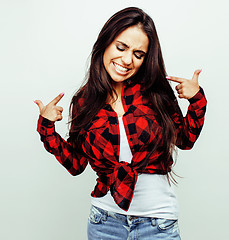 Image showing young happy smiling latin american teenage girl emotional posing on white background, lifestyle people concept 