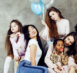 Image showing Lifestyle and people concept: young pretty diversity nations woman with different age children celebrating on birth day party together happy smiling, making selfie. African-american, asian and caucasi