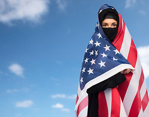 Image showing muslim woman in hijab with american flag