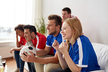 Image showing friends or football fans watching soccer at home