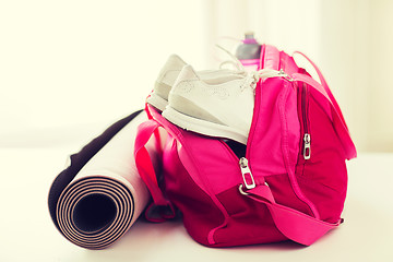 Image showing close up of female sports stuff in bag