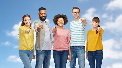 Image showing international group of people pointing on you