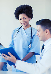 Image showing happy doctors meeting at hospital office