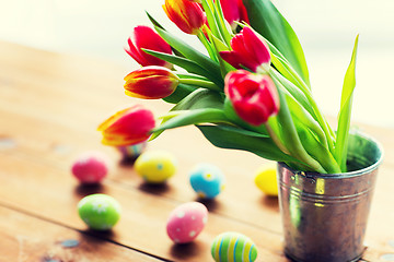 Image showing close up of easter eggs and flowers in bucket