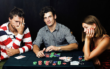Image showing young people playing poker off-line tournament, friends party concept at home