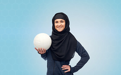 Image showing happy muslim woman in hijab with volleyball