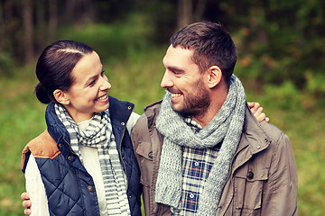 Image showing happy couple hugging at camp in woods