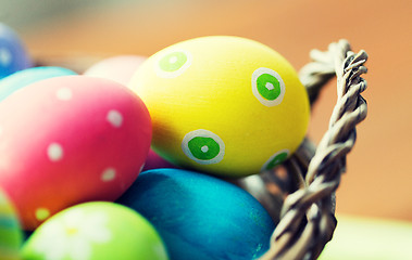 Image showing close up of colored easter eggs in basket