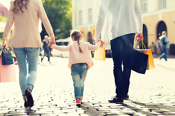 Image showing close up of family with child shopping in city