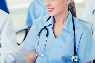 Image showing close up of doctor with stethoscope at seminar