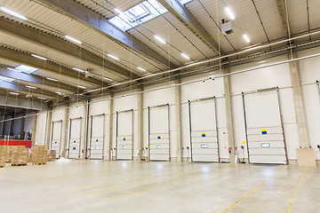 Image showing warehouse doors or gates and cargo boxes