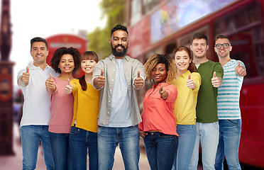 Image showing international people showing thumbs up at london