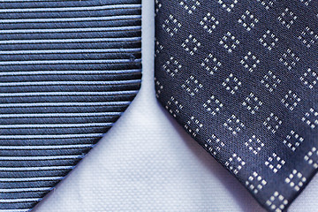 Image showing close up of blue patterned ties