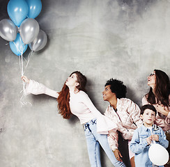 Image showing Lifestyle and people concept: young pretty diversity nations woman with different age children celebrating on birth day party together happy smiling, making selfie. African-american, asian and caucasi