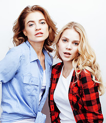 Image showing best friends teenage girls together having fun, posing emotional on white background, besties happy smiling, lifestyle people concept close up