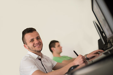 Image showing a group of graphic designers at work