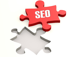 Image showing Red jigsaw puzzle with SEO word