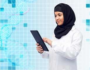 Image showing muslim female doctor in hijab with tablet pc