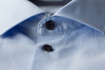 Image showing close up of blue shirt collar