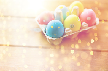 Image showing close up of colored easter eggs in egg box