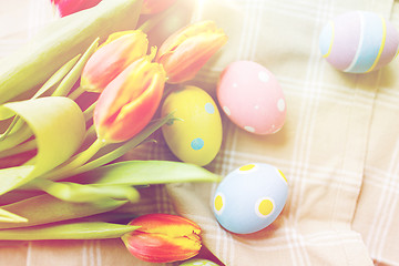 Image showing close up of colored easter eggs and flowers