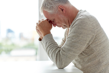 Image showing close up of senior man thinking