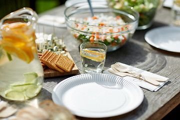 Image showing table with food for dinner at summer garden party