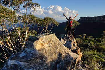 Image showing Woman top of mountain exuberant success