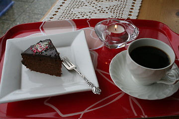 Image showing Piece of chocolate cake and coffee