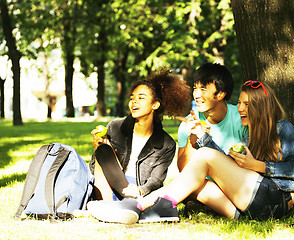 Image showing cute group of teenages at the building of university with books huggings, diversity nations