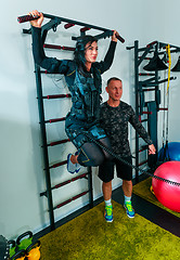 Image showing The female athlete doing they exercise in a ems fitness studio