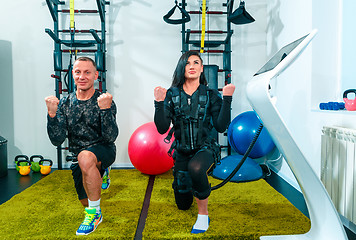 Image showing The female athlete doing they exercise in a ems fitness studio