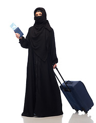 Image showing muslim woman with ticket, passport and travel bag