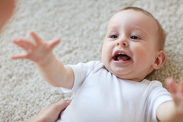 Image showing close up of happy little baby and mother