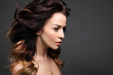 Image showing Hair Styling, feminine hairstyle Curls, hair full of volume.