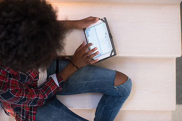 Image showing black woman using her electronic tablet