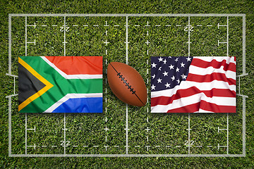 Image showing South Africa vs. USA flags on rugby field