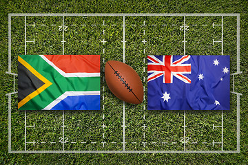 Image showing South Africa vs. Australia flags on rugby field