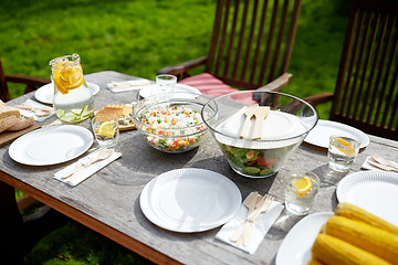 Image showing table with food for dinner at summer garden party