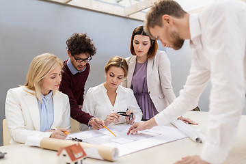 Image showing business team discussing house project at office