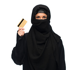 Image showing muslim woman in hijab with credit card over white