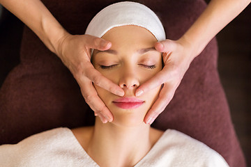 Image showing woman having face and head massage at spa